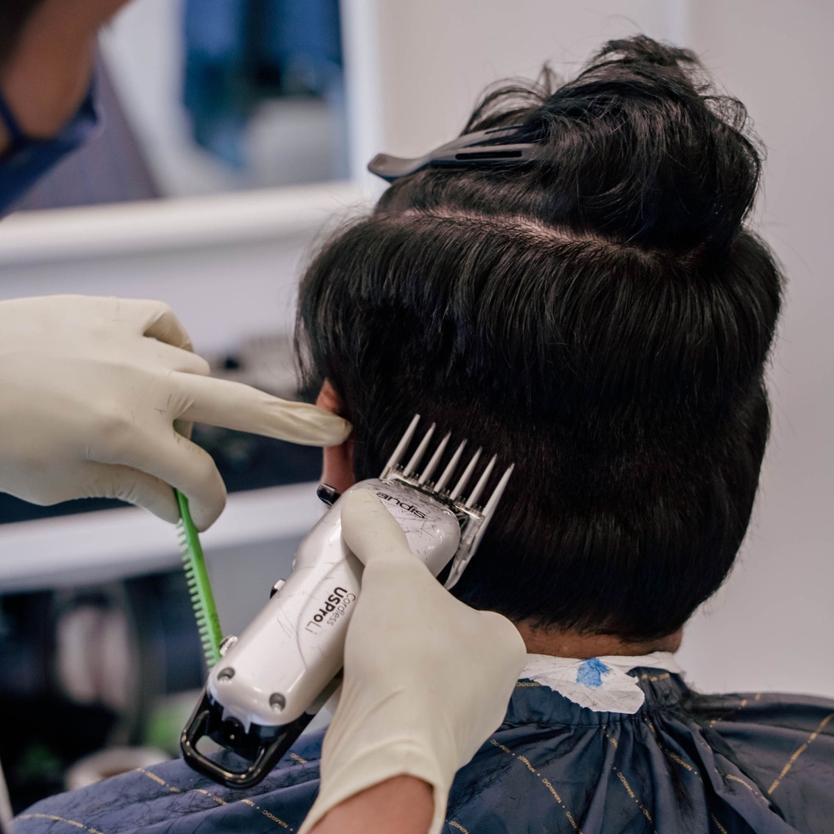 Student practising a haircut